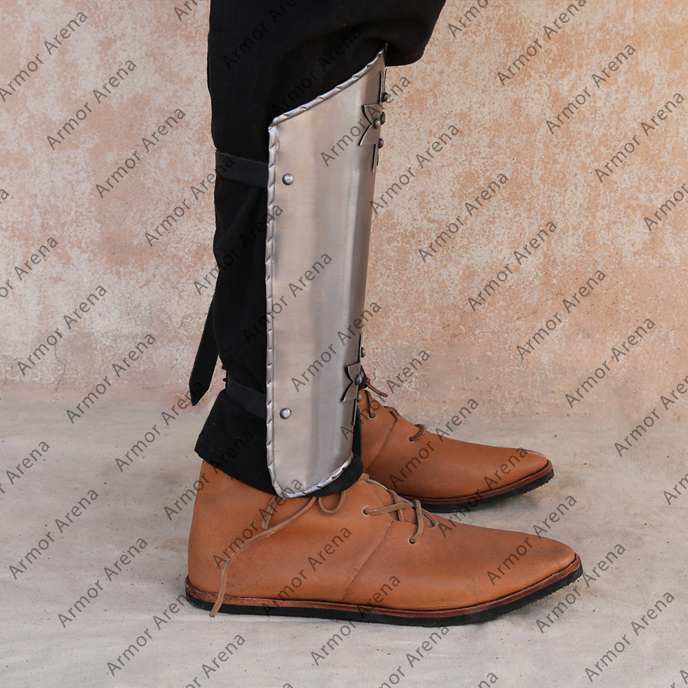Greaves with Maltese cross